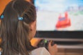 Little girl playing computer game. Royalty Free Stock Photo