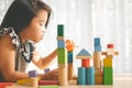 Little girl playing with construction toy blocks building a tower Royalty Free Stock Photo