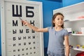 Little girl playing doctor at medical office. Royalty Free Stock Photo