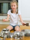 Little girl playing drums. Royalty Free Stock Photo