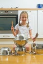 Little girl playing drums. Royalty Free Stock Photo