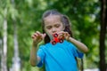 Little girl playing with fidget spinner