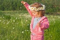 Little girl playing with flower petals Royalty Free Stock Photo