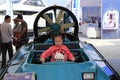 Little girl playing in the flying wing boat