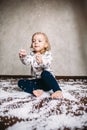 Little girl is playing with foam balls Royalty Free Stock Photo