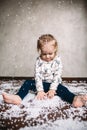 Little girl is playing with foam balls Royalty Free Stock Photo