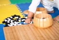 Little girl playing Go chess pieces Royalty Free Stock Photo