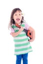Little girl playing guitar toy over white background Royalty Free Stock Photo