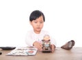 The little girl is playing an investment and financial management game Royalty Free Stock Photo