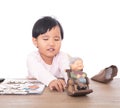The little girl is playing an investment and financial management game Royalty Free Stock Photo
