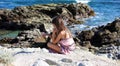 Little girl playing at ocean front in Los Cabos Mexico resort cliff sea Royalty Free Stock Photo