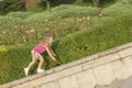 Little girl playing on parapet