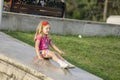 Little girl playing on parapet