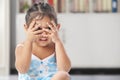 Little girl playing peekaboo Royalty Free Stock Photo