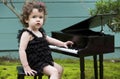 Little girl playing piano Royalty Free Stock Photo