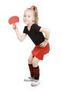 Little girl playing ping-pong.