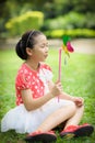 Little girl playing pinwheel Royalty Free Stock Photo