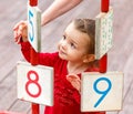 Little girl playing on the playground Royalty Free Stock Photo