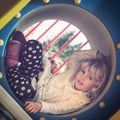 Little girl playing in the playground