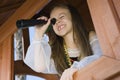 Little Girl Playing In A Playhouse Royalty Free Stock Photo