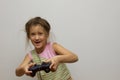 Little girl playing with playstation joystick Royalty Free Stock Photo