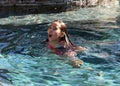 Little girl playing at the pool in Mexican villa Royalty Free Stock Photo