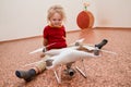 Little girl playing with quadrocopter Royalty Free Stock Photo