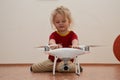 Little girl playing with quadrocopter Royalty Free Stock Photo