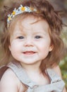 Little girl playing with rabbit in the village. Outdoor. Summer portrait. Royalty Free Stock Photo