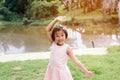 Little girl playing at river side. Royalty Free Stock Photo