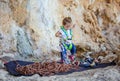 Little girl playing with rock climbing equipment Royalty Free Stock Photo
