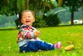 The little girl playing s.viridis alone(Asia, China, Chinese) Royalty Free Stock Photo