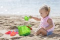 Little girl playing sand toys at the beach Royalty Free Stock Photo