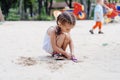 Little Girl Playing Sandbox Playground Digging Sand Shovel Building Sand Figure Summer Day Royalty Free Stock Photo