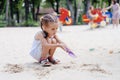 Little Girl Playing Sandbox Playground Digging Sand Shovel Building Sand Figure Summer Day Royalty Free Stock Photo