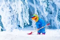 Little girl playing with snow in winter Royalty Free Stock Photo