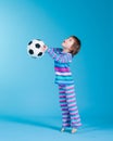 Little girl playing with soccer ball Royalty Free Stock Photo