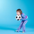 Little girl playing with soccer ball Royalty Free Stock Photo