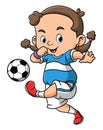 The little girl is playing the soccer and kicking the ball Royalty Free Stock Photo