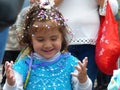 Little girl playing with spray foam on carnival, Cuenca