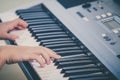 Little girl playing synthesizer Royalty Free Stock Photo