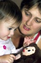 Little girl playing with toy