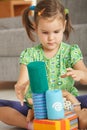 Little girl playing with toy blocks Royalty Free Stock Photo