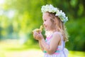 Little girl playing with a toy duck Royalty Free Stock Photo