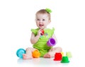 Little girl playing with toys Royalty Free Stock Photo