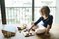 Little Girl Playing Toys Concept