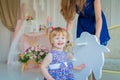 Little girl playing on wooden rocking horse Royalty Free Stock Photo