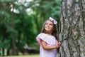 Little girl playing in the woods summer Royalty Free Stock Photo