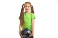 Little girl plays with ball in studio Royalty Free Stock Photo