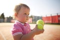 Little girl plays tennis Royalty Free Stock Photo